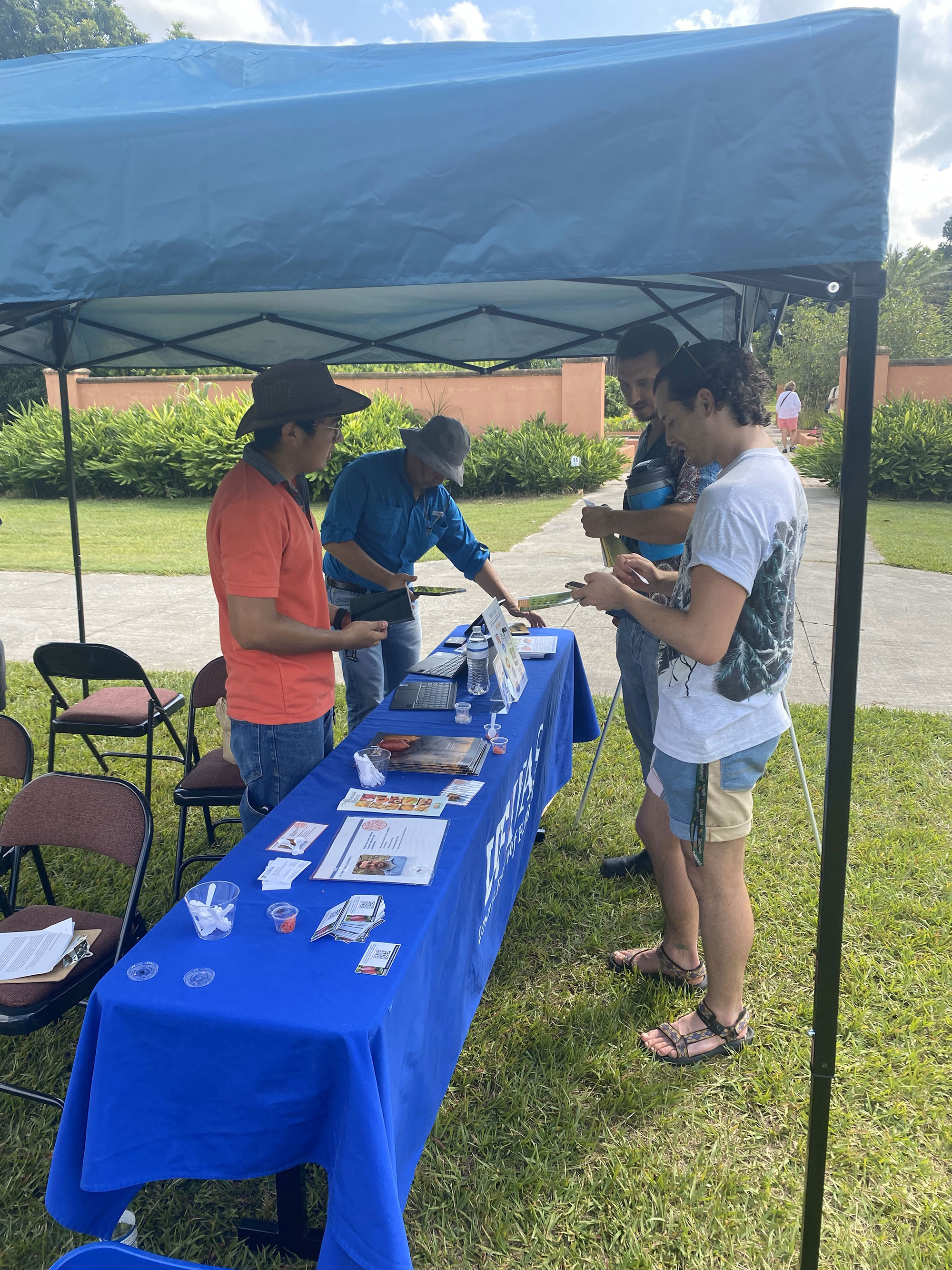 People getting information at event display